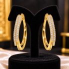 Diamond-Studded Gold Hoops on Velvet Stand
