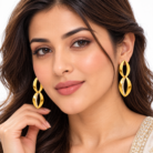 Elegant Gold Leaf Earrings Portrait